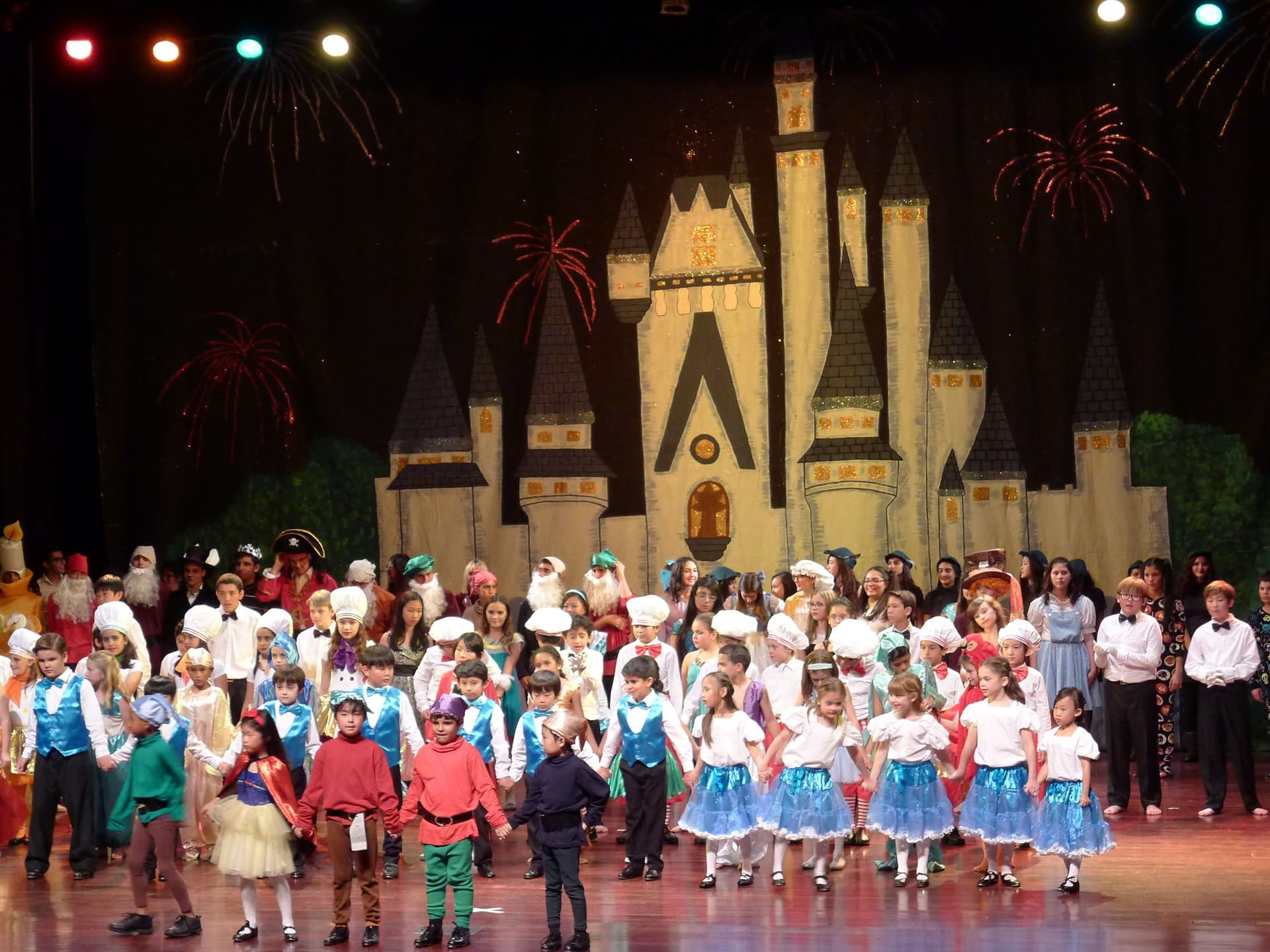 Elementary students performing on stage at a school program